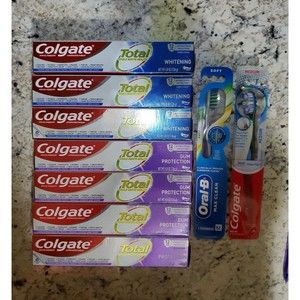 Colgate toothpaste and toothbrush ( colgate & oral b) lot of 9